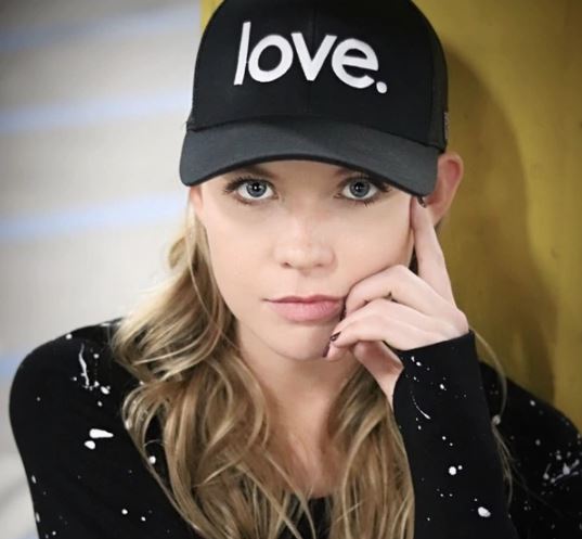 love Trucker Hat available in Black and White