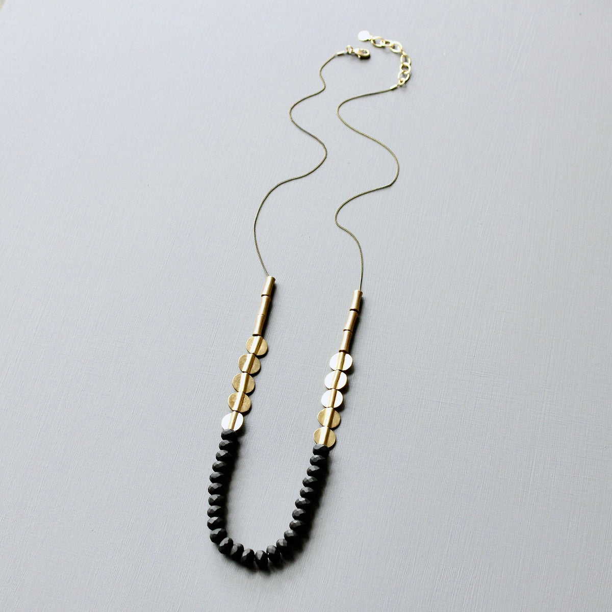 JLT130 black and brass long necklace