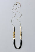 JLT130 black and brass long necklace