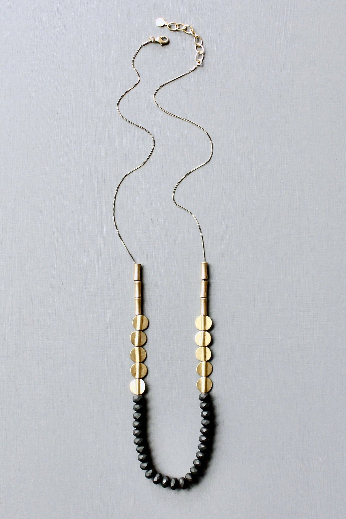 JLT130 black and brass long necklace